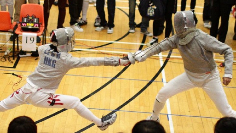 Out of a sense of brotherhood, John Tsang teaches fencing at his alma mater La Salle College. He says that sense has a lot of similarities with 'localism.'