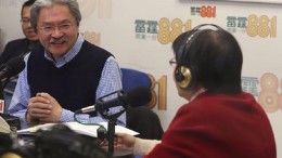 Financial Secretary John Tsang Chun-wah attends a Commercial Radio programme on his just-announced Budget.