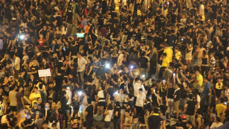 Verbal and physical violence in protest are escalating in Hong Kong. Police used teargas to clear protests in Occupy Central movement.