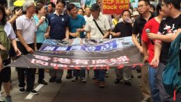 Bookseller Lam Wing-kee joins a march against threats to 'one country, two systems' posed by Beijing's handling of the missing bookseller case.