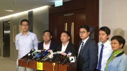 Democratic Party chairman Wu Chi-wai (third from left) says sorry for his remarks on a amnesty for Occupy participants.