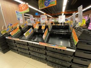 Empty vegetable boxes in a supermarket.