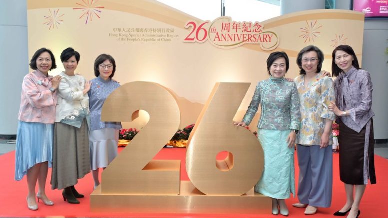 Female ministers of the Hong Kong SAR government in traditional Chinese dress to celebrate the 26th anniversary of the 1997 Handover.