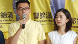 Cheng Kam-mun (left) of the Civic Passion, who signs a confirmation note in his nomination for Legco poll, was asked by election office to explain his pro-independence stance by Wednesday.