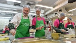 Financial Secretary John Tsang joins his predecessor Antony Leung at a charity project organised by Food Angel. Both are tipped as hopefuls for the next chief executive.