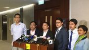 Democratic Party chairman Wu Chi-wai (third from left) says sorry for his remarks on a amnesty for Occupy participants.