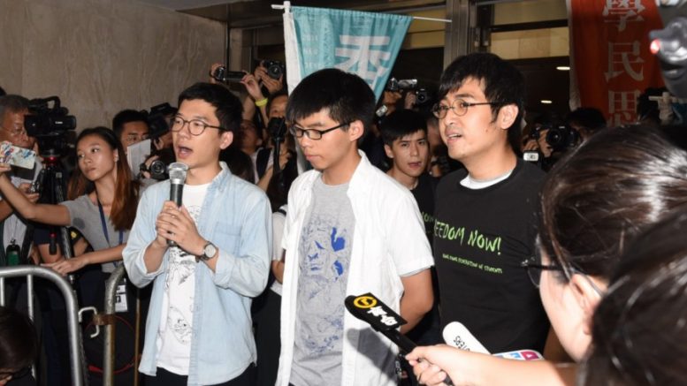 Three young student leaders of the Umbrella Movement put to jail.